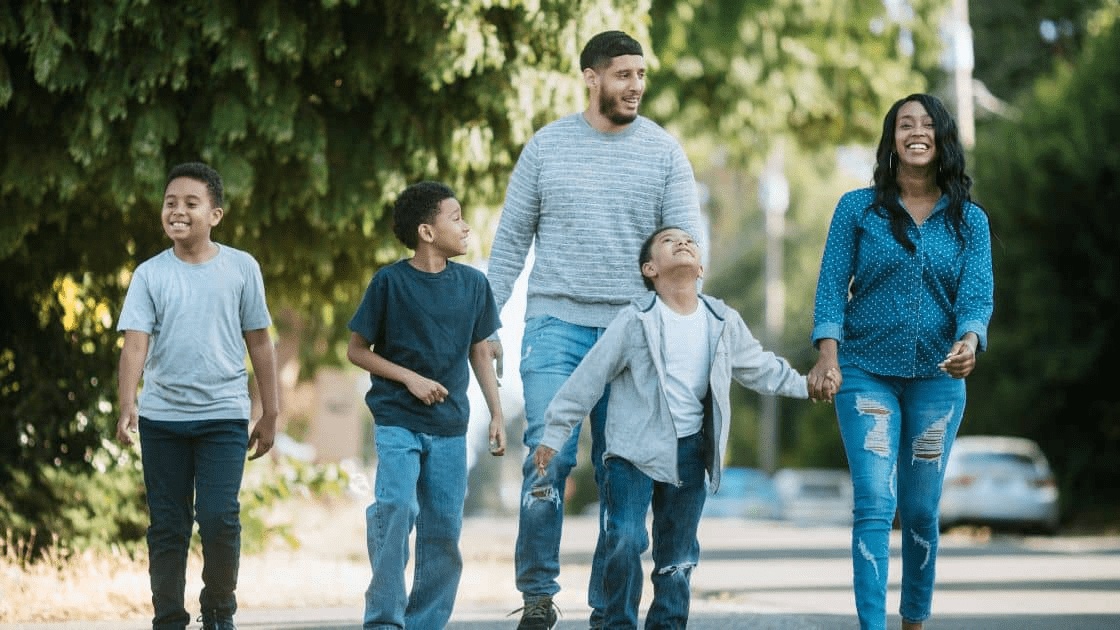 A family familiarizing themselves with a new neighborhood