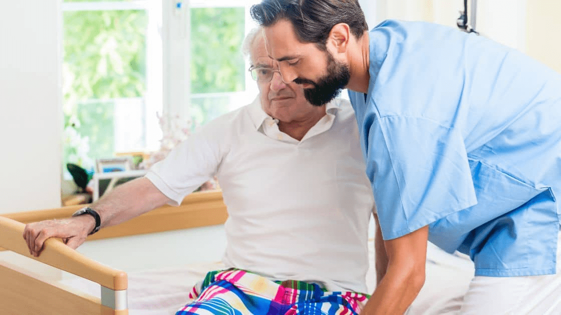 A senior is getting help from a professional during moving day