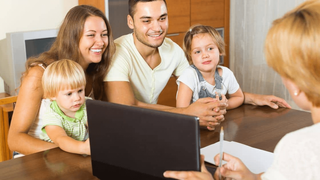 A family discussing their moving insurance for different situations with an insurance provider